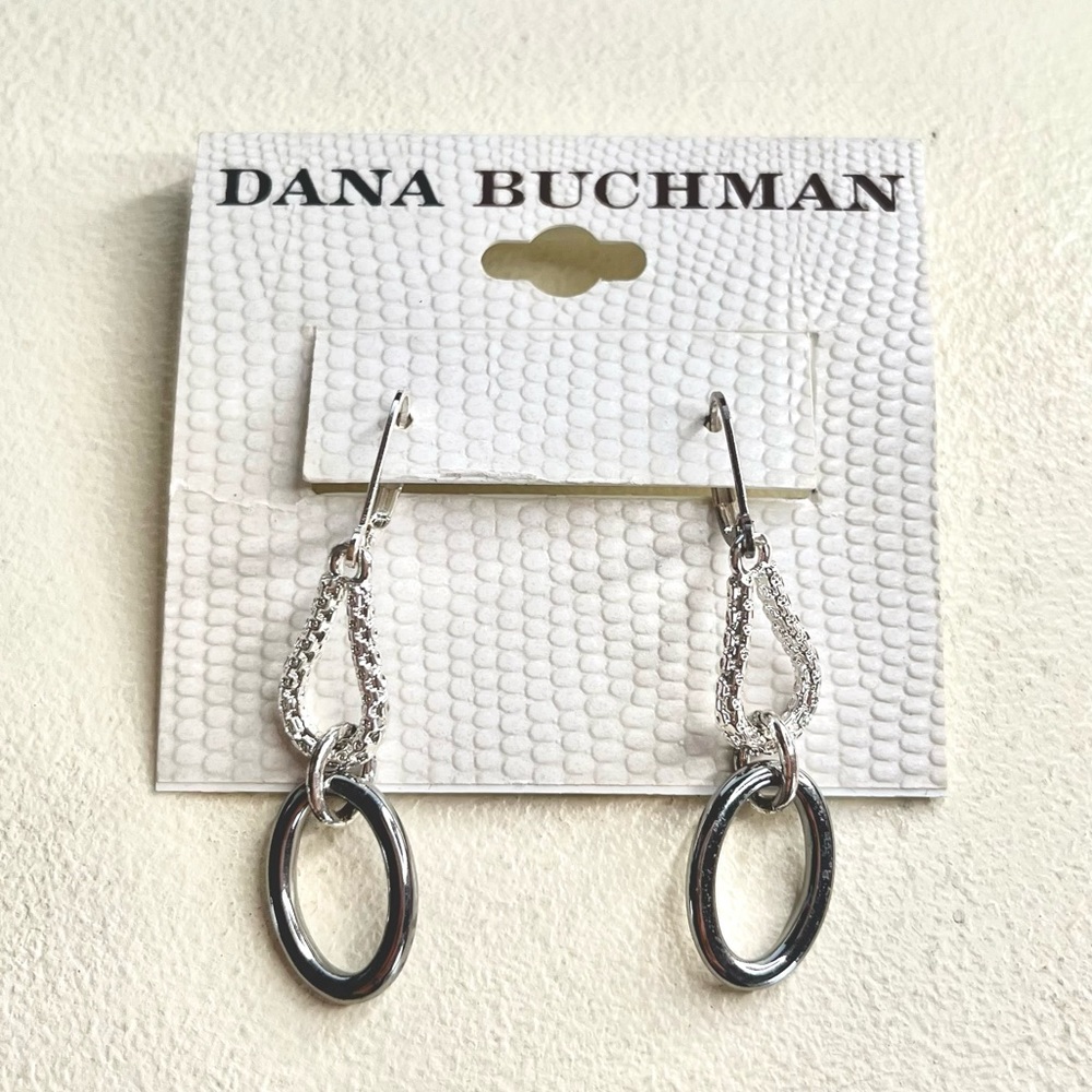 Silver dangle earrings by Dana Buchman